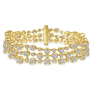 Gabriel & Co. TB4473Y84JJ 18 karat yellow gold Lusso bracelet, front view of three strands of diamonds meeting at a clasp bar with a maker's mark