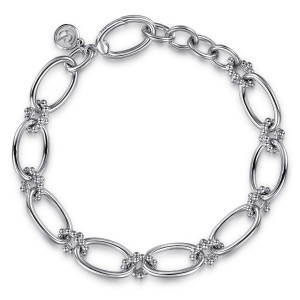 Gabriel & Co. TB4650-75SVJJJ sterling silver Bujukan bracelet, front view of open oval links joined by bead clusters, with an oval clasp and a maker's tag