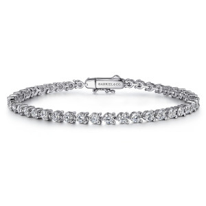 Gabriel & Co. TB4857W45JJ 14 karat white gold Lusso bracelet, front view of a prong set diamond tennis line closing on a box clasp with a maker's mark