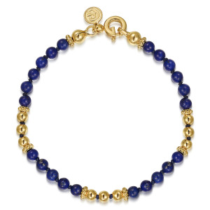 Gabriel & Co. TB4912Y4JLP 14 karat yellow gold Bujukan bracelet, front view of knotted blue beads and metal bead runs with a spring ring clasp and tag