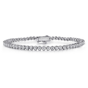 Gabriel & Co. TB4954W45JJ 14 karat white gold Lusso bracelet, front view of the diamond line with a box clasp and safety latch bearing a maker's mark