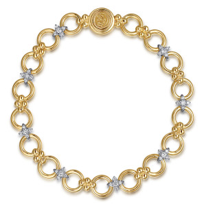 Gabriel & Co. TB5061M45JJ 14 karat white and yellow gold Bujukan bracelet, front view of open rings, metal bead clusters and pave stars around a round maker's plate