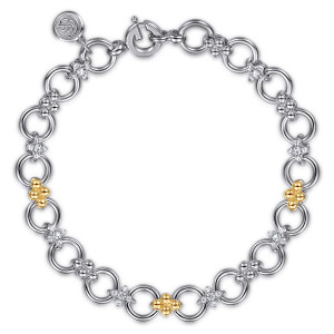 Gabriel & Co. TB5256-7MZJWS sterling silver and 14 karat yellow gold Bujukan bracelet, front view of open rings with pave connectors, bead clusters and a maker's tag