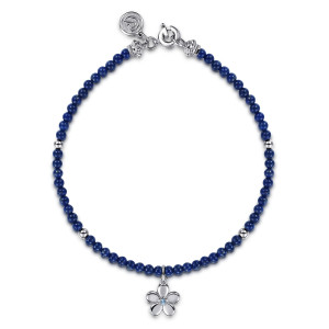Gabriel & Co. TB5276LPSVJMC sterling silver Color bracelet, front view of a strand of deep blue beads with a flower charm, spring ring and maker's tag