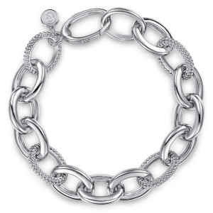 Gabriel & Co. TB5390-75SVJJJ sterling silver Bujukan bracelet, front view of a looped chain of polished ovals with a maker's tag beside the clasp ring