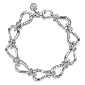 Gabriel & Co. TB5397SVJWS sterling silver Bujukan bracelet, front view of tapering loops joined by pave bars, with a lobster clasp and tag at the top