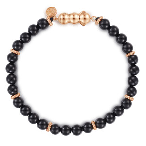 Gabriel & Co. TBM4533K4JOX 14 karat rose gold Bujukan men's bracelet, top view of the full loop of glossy beads with twisted spacers and a lobed connector
