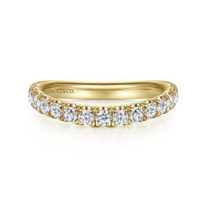 Gabriel & Co. WB12337R6Y44JJ 14 karat yellow gold Contemporary wedding band, front view of a shallow curve along the row of round stones and their small prongs