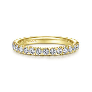 Gabriel & Co. WB14649R8Y44JJ 14 karat yellow gold Classic wedding band, front view of a straight band with one row of round stones held in shared prongs