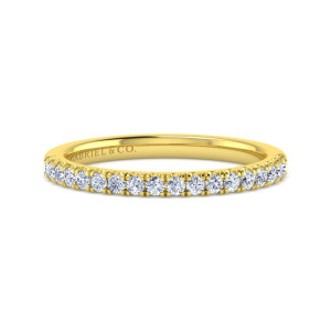 Gabriel & Co. WB14684O20Y44JJ 14 karat yellow gold Contemporary wedding band, front view of round diamonds close together along the top above a glossy rounded inside