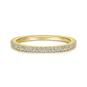Gabriel & Co. WB14684R4Y44JJ 14 karat yellow gold Contemporary wedding band, front view of the row of diamonds held in slender prongs across the top