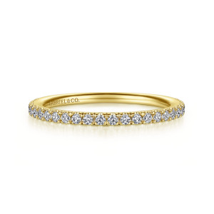 Gabriel & Co. WB14719R4Y44JJ 14 karat yellow gold Contemporary wedding band, front view of a tight line of small stones separated by tiny prongs