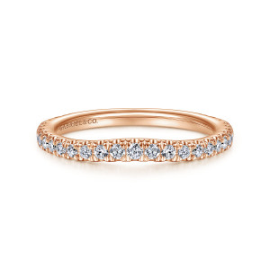 Gabriel & Co. WB14794R4K44JJ 14 karat rose gold Contemporary wedding band, front view of the slight dip in the top edge with round stones in small prongs