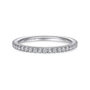 Gabriel & Co. WB14914O4W44JJ 14 karat white gold Contemporary wedding band, front view of the straight hoop with round diamonds continuing past both shoulders