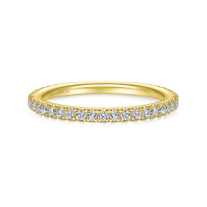 Gabriel & Co. WB14914O4Y44JJ 14 karat yellow gold Contemporary wedding band, front view of a straight hoop with a long line of round diamonds and a script maker's mark