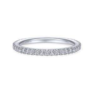 Gabriel & Co. WB14914R5W44JJ 14 karat white gold Contemporary wedding band, front view of tiny round diamonds in fine prongs along a straight hoop, with a maker's mark inside