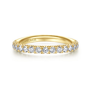 Gabriel & Co. WB14994R8Y44JJ 14 karat yellow gold Contemporary wedding band, front view of a close line of round diamonds, each held by small prongs