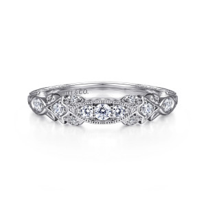 Gabriel & Co. WB15027R6W44JJ 14 karat white gold Victorian wedding band, front view of a pointed oval frame with beaded rim, flanked by kite shaped frames
