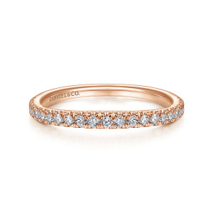 Gabriel & Co. WB15030R6K44JJ 14 karat rose gold Contemporary wedding band, front view of a row of round diamonds between pointed prongs and a maker's mark inside