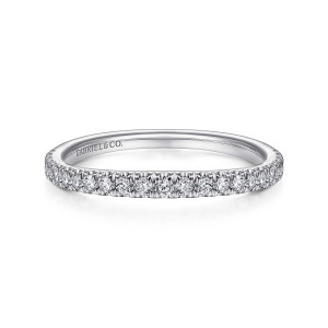 Gabriel & Co. WB15030R6W44JJ 14 karat white gold Contemporary wedding band, front view of a single line of round diamonds with a maker's mark inside the band