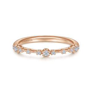 Gabriel & Co. WB15195R4K44JJ 14 karat rose gold Starlight wedding band, front view of spaced round stones linked by short beaded bars, the middle stone raised