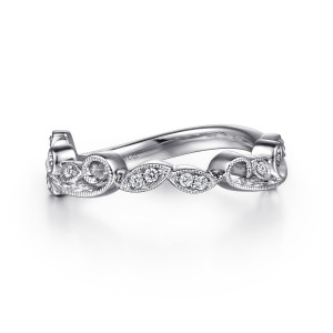 Gabriel & Co. WB15207O4W44JJ 14 karat white gold Floral Nouveau wedding band, front view of leaf shaped panels holding paired diamonds between beaded scrolls along the wavy top