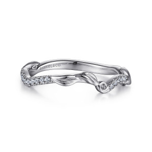 Gabriel & Co. WB15759R4W44JJ 14 karat white gold Floral Nouveau wedding band, front view of a wavy band with a curled leaf between two short runs of small stones