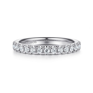 Gabriel & Co. WB15845P12W44JJ 14 karat white gold Classic wedding band, front view of closely spaced round diamonds with pointed prong tips between them