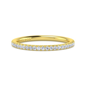 Gabriel & Co. WB16058R4Y44JJ 14 karat yellow gold Classic wedding band, front view of evenly sized round diamonds with tiny prongs along a smooth polished hoop