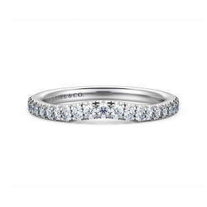 Gabriel & Co. WB16121E8W44JJ 14 karat white gold Contemporary wedding band, front view of the shallow center dip where the row of round diamonds curves inward