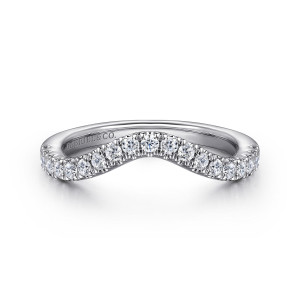 Gabriel & Co. WB16216P12W44JJ 14 karat white gold Classic wedding band, front view of a band dipping at the middle with a line of round stones following the curve