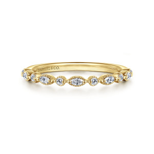 Gabriel & Co. WB16233R6Y44JJ 14 karat yellow gold Contemporary wedding band, front view of round and pointed diamonds alternating in beaded frames along the top