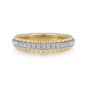 Gabriel & Co. WB16248R6M44JJ 14 karat white and yellow gold Bujukan wedding band, front view of a diamond row framed by beaded borders on both edges