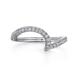 Gabriel & Co. WB16278O6W44JJ 14 karat white gold Contemporary wedding band, front view of a tall arch of stones turning at a sharp point into a lower angled run