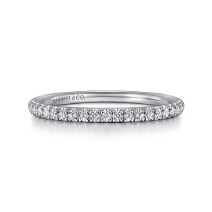 Gabriel & Co. WB16321E6W44JJ 14 karat white gold Contemporary wedding band, front view of a level row of tiny round diamonds held by needle fine prongs