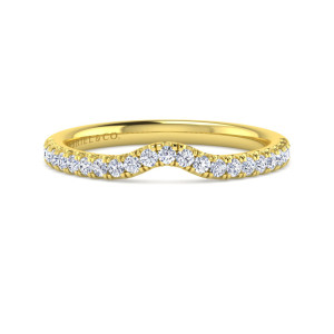Gabriel & Co. WB16336O8Y44JJ 14 karat yellow gold Contemporary wedding band, front view of the dipped top edge with a single line of small round diamonds