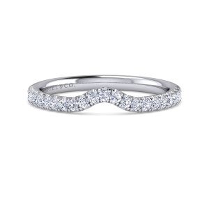 Gabriel & Co. WB16336P8W44JJ 14 karat white gold Contemporary wedding band, front view of the stones dipping in a smooth curve at the center of the band