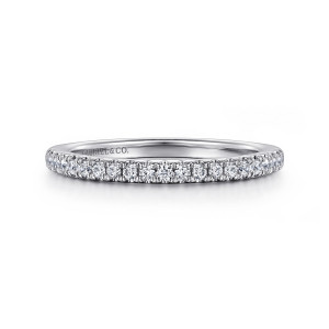 Gabriel & Co. WB16339R12W44JJ 14 karat white gold Contemporary wedding band, front view of a straight level row of small round diamonds with tiny prongs between them