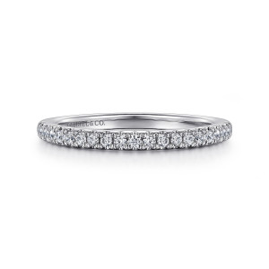 Gabriel & Co. WB16339R6W44JJ 14 karat white gold Contemporary wedding band, front view of a level row of small round stones between shared prongs