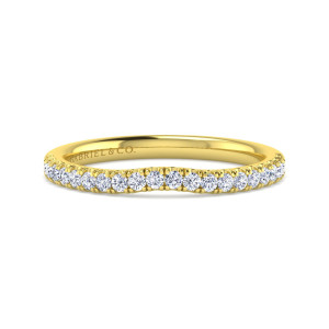 Gabriel & Co. WB16355R4Y44JJ 14 karat yellow gold Contemporary wedding band, front view of the shallow dip in the row of small round diamonds