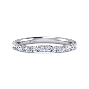 Gabriel & Co. WB16356R4W44JJ 14 karat white gold Contemporary wedding band, front view of a shallow scoop in the edge with round diamonds following it
