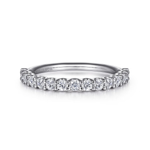 Gabriel & Co. WB16372R6W44JJ 14 karat white gold Contemporary wedding band, front view of the unbroken line of round diamonds with prongs shared between neighboring stones