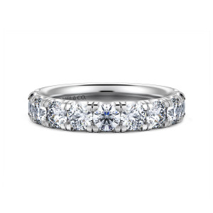 Gabriel & Co. WB16422R8W44JJ 14 karat white gold Contemporary wedding band, front view of large round diamonds set side by side along the top of a straight hoop