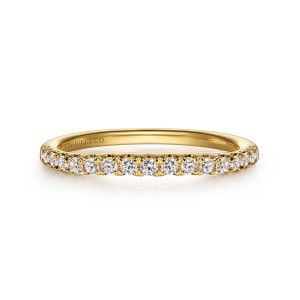 Gabriel & Co. WB16444R6Y44JJ 14 karat yellow gold Contemporary wedding band, front view of an even line of round diamonds between rounded prong tips