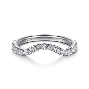 Gabriel & Co. WB16464E6W44JJ 14 karat white gold Contemporary wedding band, front view of a wave-like top edge with round diamonds lifting into an arch at the middle