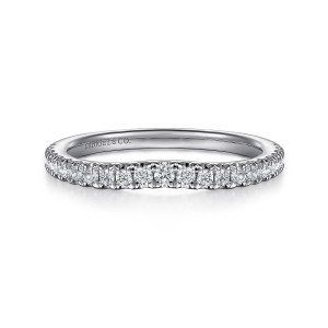 Gabriel & Co. WB16468R8W44JJ 14 karat white gold Contemporary wedding band, front view of small round diamonds with a slight dip at the middle of the row