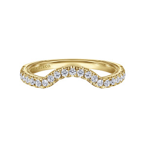 Gabriel & Co. WB16475O6Y44JJ 14 karat yellow gold Contemporary wedding band, front view of a deep central curve carrying a single line of round diamonds