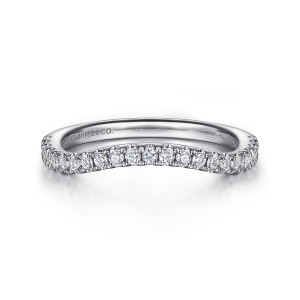 Gabriel & Co. WB16495R6W44JJ 14 karat white gold Contemporary wedding band, front view of the wide inward bend along the top edge, with round stones following its curve