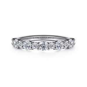 Gabriel & Co. WB16496R4W44JJ 14 karat white gold Contemporary wedding band, front view of alternating larger and smaller round diamonds sharing beaded prongs across the top