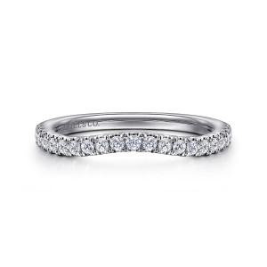 Gabriel & Co. WB16502R8W44JJ 14 karat white gold Contemporary wedding band, front view of a band whose top edge scoops smoothly beneath a row of round stones
